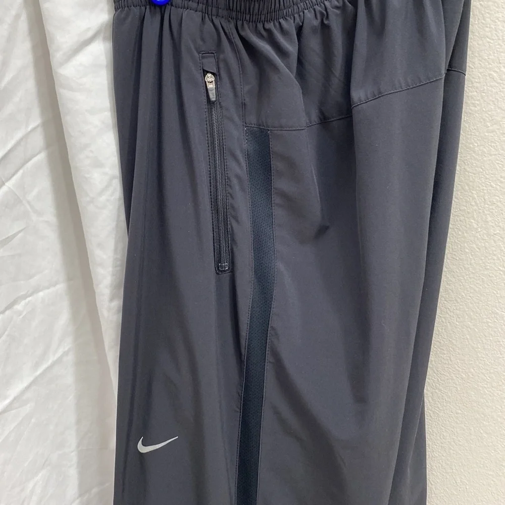 Nike Men’s Dri-Fit black running joggers. Size small.